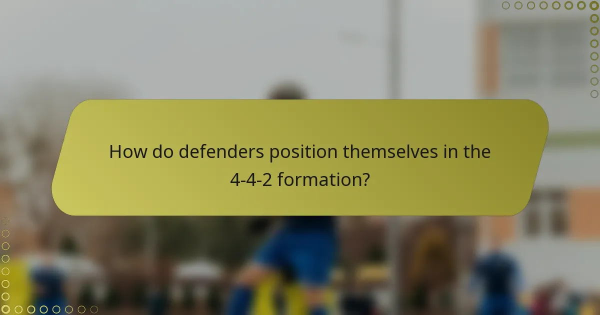 How do defenders position themselves in the 4-4-2 formation?